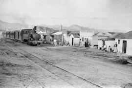 Playas de San Andrés. Paso del tren. Octubre de 1954. Málaga, España.