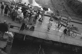 Arroyo de La Caleta y calles embarradas por las inundaciones del 29 de octubre de 1955. Málaga, España.