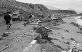 Efectos del temporal de levante en la carretera de Cádiz, entre Torremolinos y Fuengirola. Enero de 1963. Málaga, España.