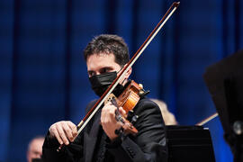 Violinista. Concierto de Bandas Sonoras de la 31 edición de Fancine de la Universidad de Málaga. Auditorio de la Escuela Técnica de Ingeniería de Telecomunicaciones e Informática. Noviembre de 2021